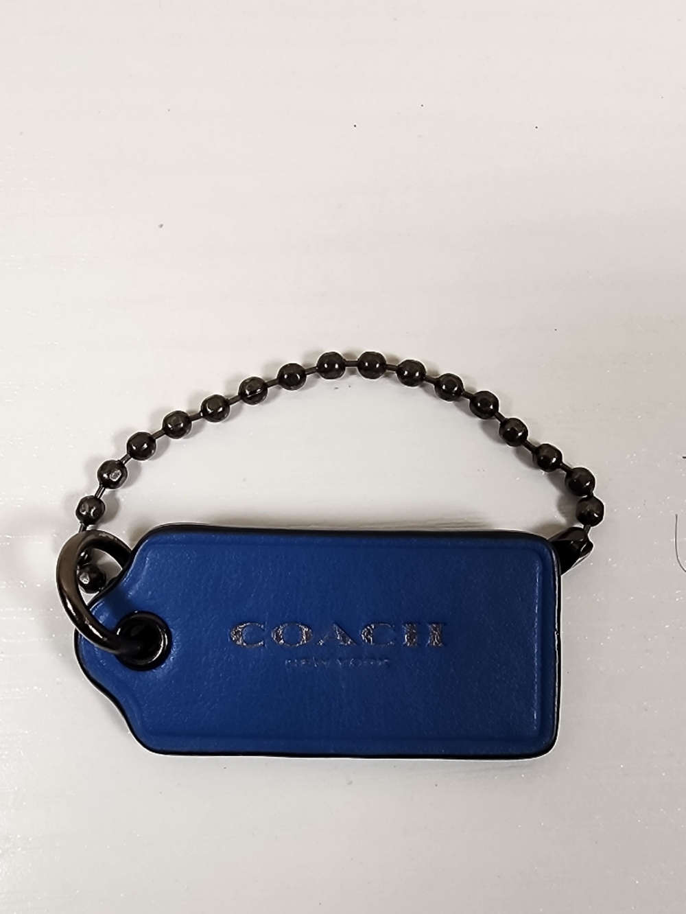 Blue Coach Hangtag with Gunmetal Hardware